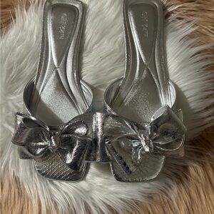 ON 34th Women's Jazminn Bow Slip-on Slide Flat Sandals in Silver.